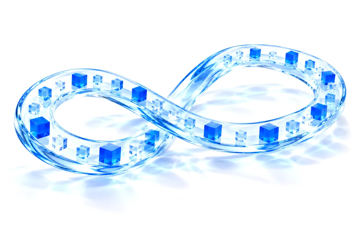 Abstract render: blue cubes moving in single file along a glass circuit shaped like a continuous loop.